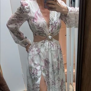 Long, floral cut out dress.